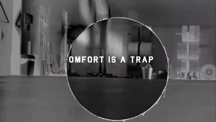 The title Comfort Is a Trap inside the circle
