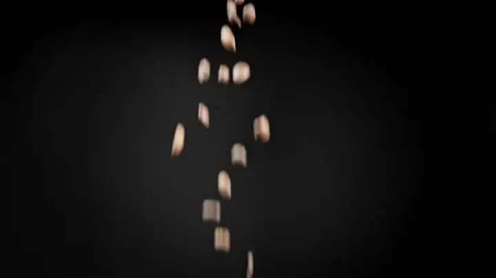 Coffee beans in a single beam of light