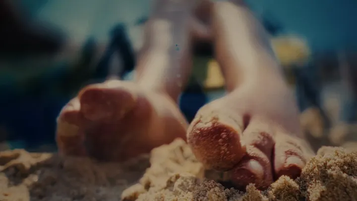 Feet in the sand