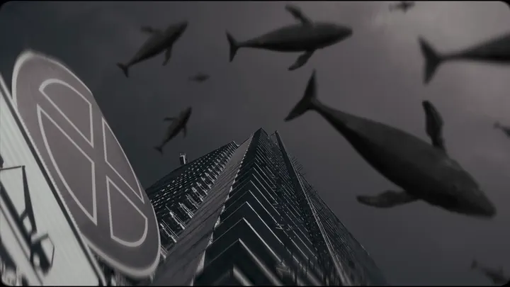 Whales over a skyscraper
